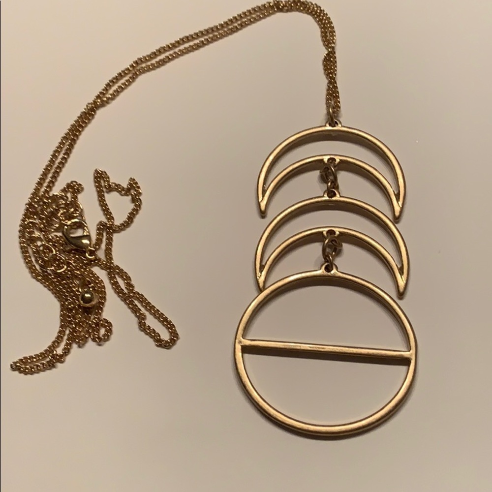 Gold necklace two moons and a circle